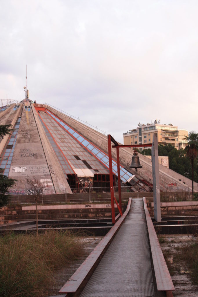view of the peace bell and pyramid in tirana