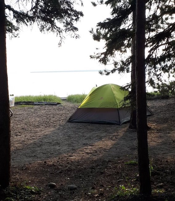 tent on a sandy site at Agawa Bay Campground