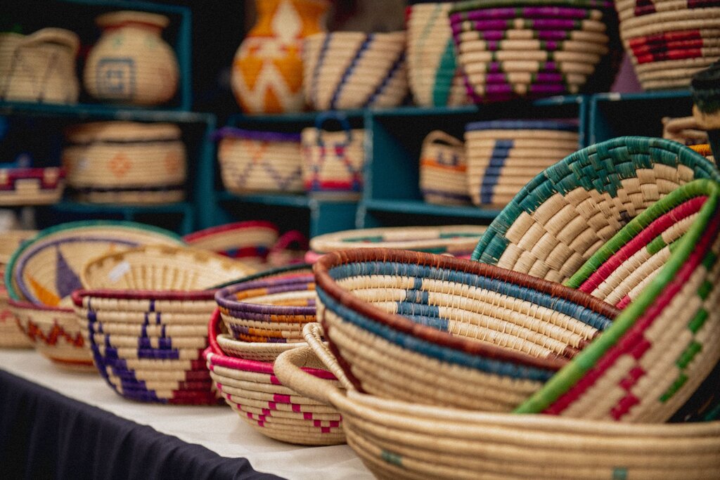 woven bowls on display on a shelf - these bowls are made in colombia