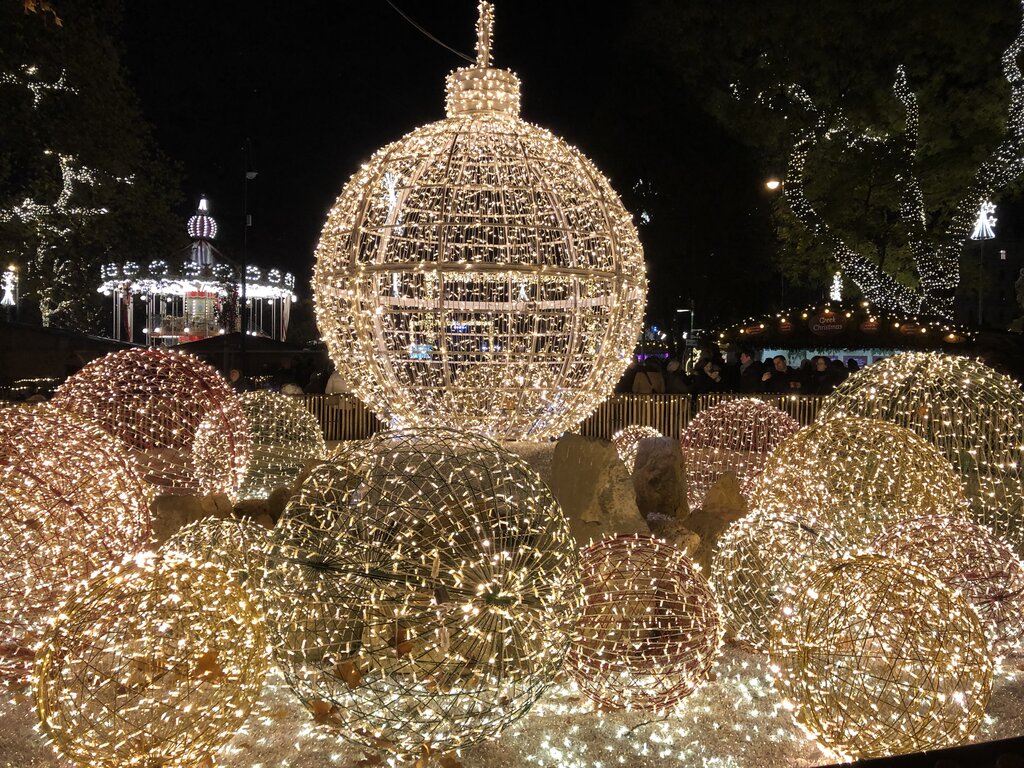 large light illumination of christmas balls in the rathaus park in vienna