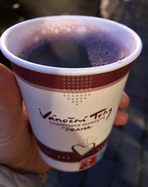 mulled wine in a cup at Christmas Markets in praguewith words vanocne trny Christmas Markets Praha