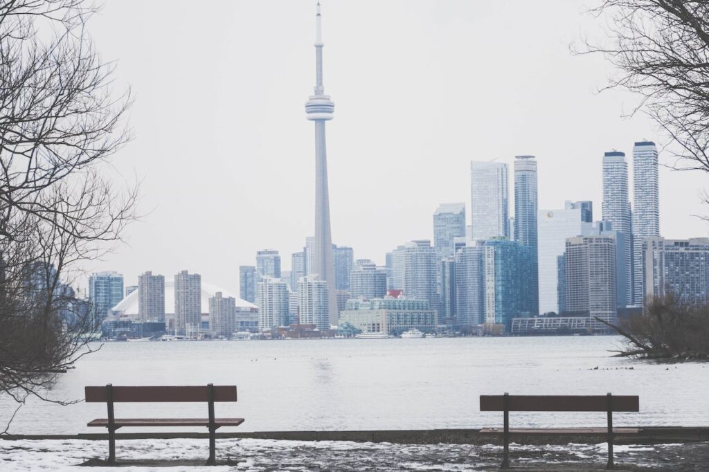 toronto skyline during winter - take a ferry ride out to toronto islands if you’re visiting toronto in December